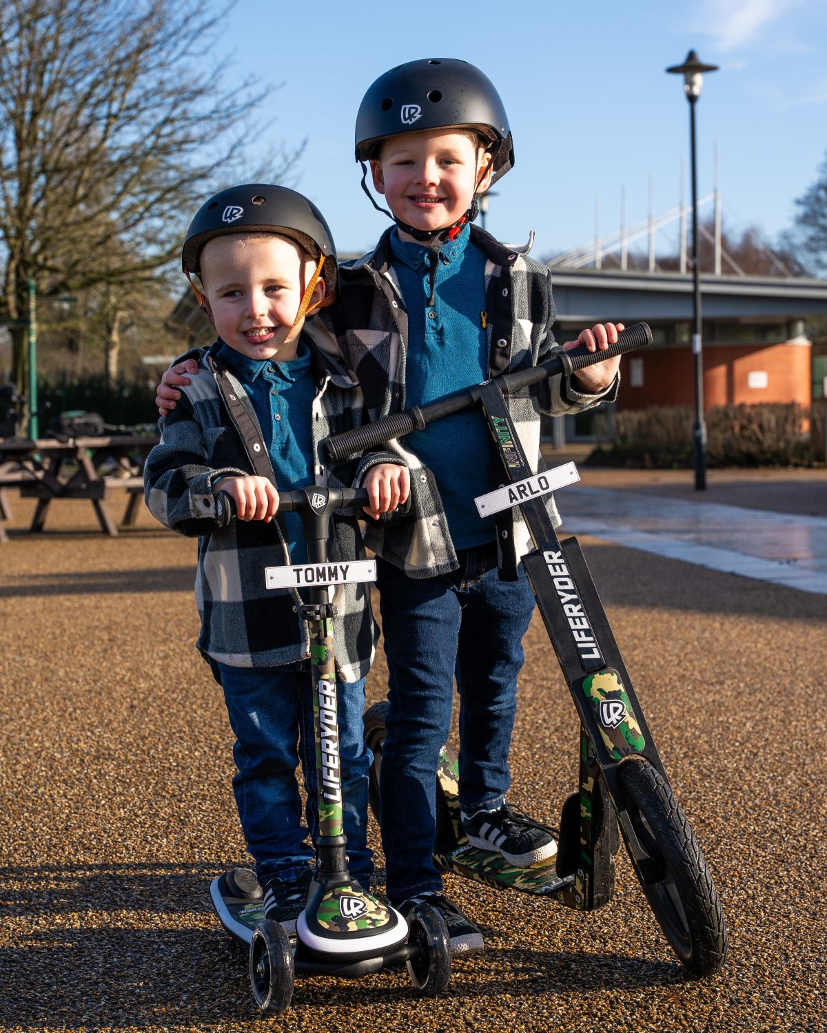 Children riding LIFERYDER INFINITY and HALO scooters outdoors